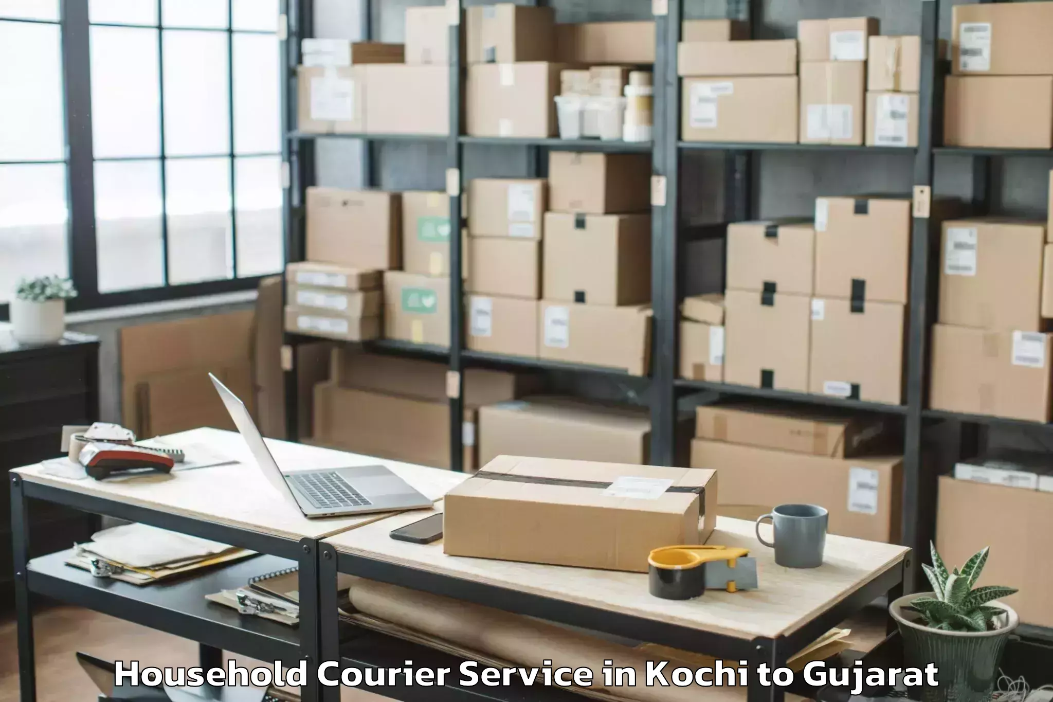 Professional Kochi to Keshod Airport Ixk Household Courier